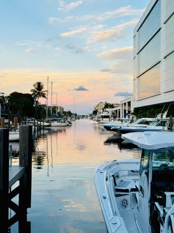 Boats along the canal at sunset