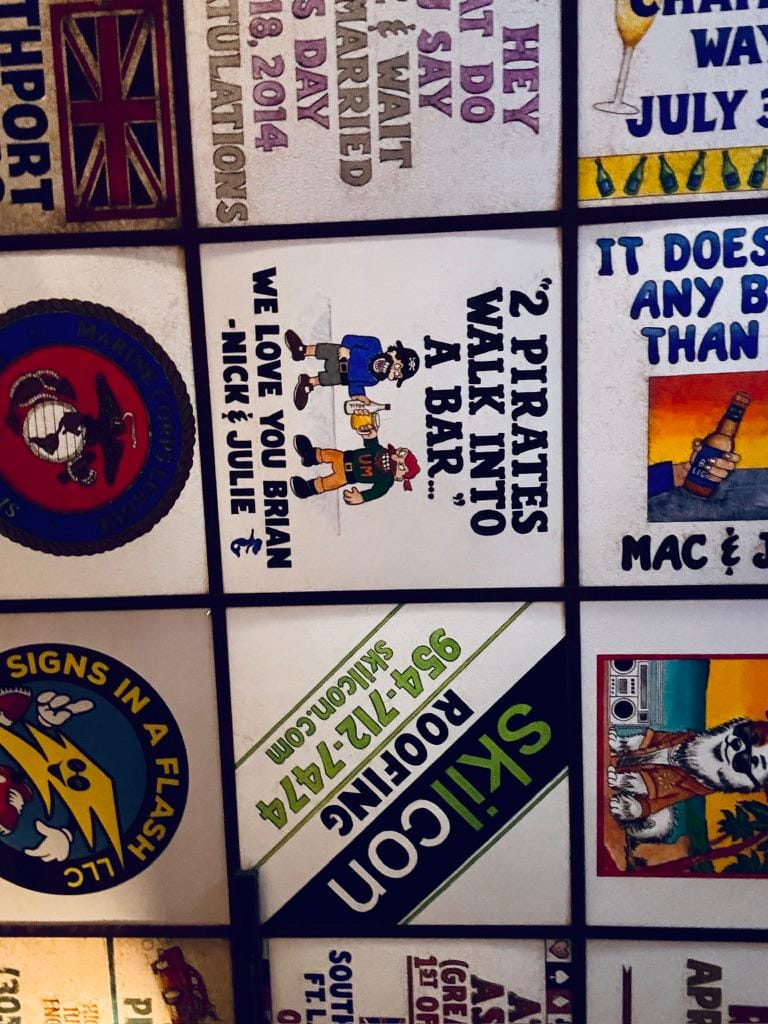 Personalized ceiling tiles painted with jokes, names and logos